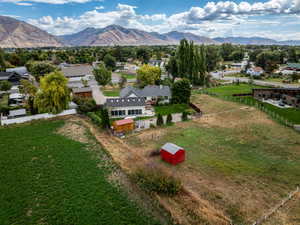 Aerial view of residential area featuring mountains