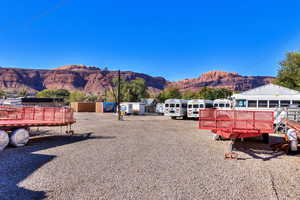 View of dirt / gravel road with a mountain view