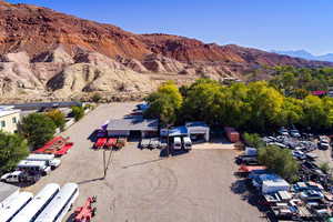 View of subject property featuring a mountainous background