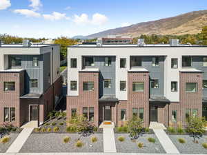 View of building exterior featuring a mountain view