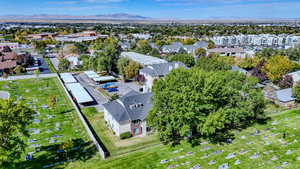 Aerial perspective of suburban area featuring a mountain backdrop