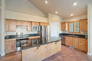 Enjoy the views while preparing meals. Kitchen features a pantry.