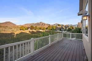 Wooden deck with a mountain views, overlooking wetlands, no backyard neighbors.