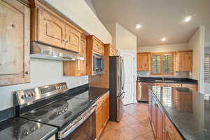 Recessed lights, new appliances, move-in condition.
