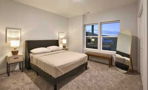 Bedroom with carpet and baseboards
