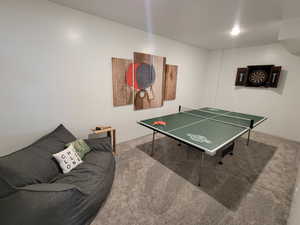 Game room featuring carpet floors