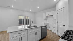 Kitchen featuring white cabinetry, dark wood-style floors, recessed lighting, dishwasher, and black gas range oven