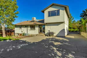 Back of property with brick siding