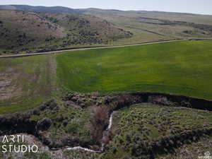View of property location featuring mountains and rural landscape