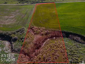 Overview of rural landscape with property parcel outlined