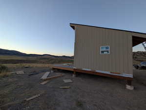 View of vehicle parking with a mountain view