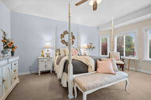 Primary Owner's Bedroom suite with ceiling fan, large bay windows, amazing views with ensuite bathroom and walk-in closet