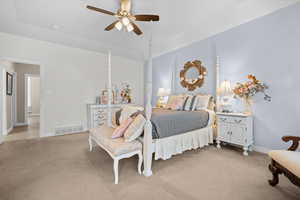 Bedroom featuring light carpet and ceiling fan