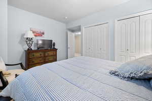 Bedroom featuring two closets