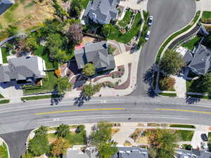 Aerial view of property's location with nearby suburban area