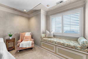 Living area featuring ornamental molding, carpet flooring, and recessed lighting