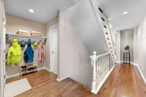 Mudroom featuring wood finished floors and recessed lighting