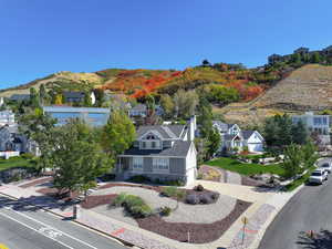 Aerial view of residential area with a mountainous background