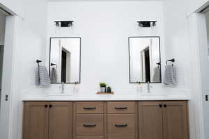 Full bathroom with double vanity