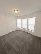 2nd Bedroom featuring carpet flooring and very nice honeycombed blinds