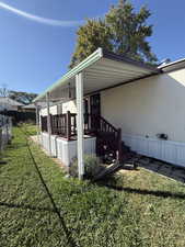 View of property exterior with a porch