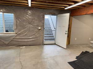 Basement featuring stairway