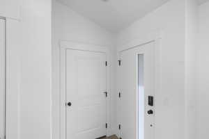 Hall with wood finished floors