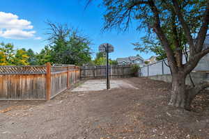View of fenced backyard