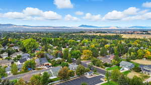 Aerial view of residential area featuring mountains