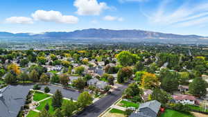 Aerial view of residential area with a mountain backdrop