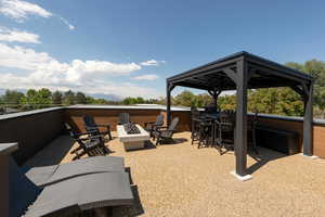 View of patio / terrace with a fire pit