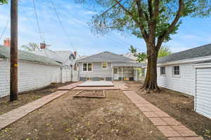 Rear view of house with a patio area