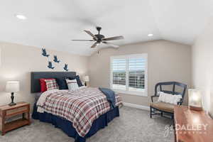 Upstairs bedroom features soft carpet, a spacious layout, a full closet, and west-facing views from the window.