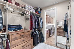 Here you see the view into the laundry room from the primary closet.