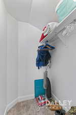 Walk-in closet in the upstairs bedroom.