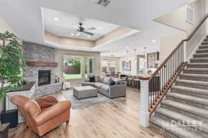 The view into the great room with the stairs on the right and the beautiful fireplace on the left.
