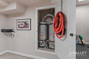 The water heaters are elevated and enclosed in their own closet, safely tucked out of sight.