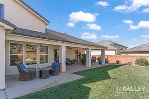 Sit and enjoy the fire pit with friends and family on the large patio.