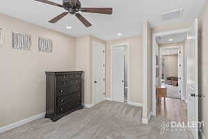 The bathroom has a sliding pocket door for privacy.