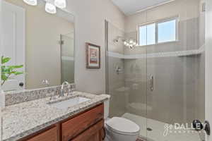 The bathroom on the 2nd guest room on the back side of the home. This bathroom has a large storage closet in it for extra linens and supplies.