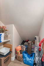 The space under the stairs is ideal for storing a vacuum, cleaning supplies, or even luggage.