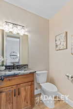 Located just past the office and before the stairs in the front entry.