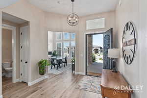 The entryway is bright and welcoming, offering plenty of room without feeling crowded or wasted, just the perfect size.