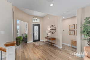 The iron front door is beautiful with a screen that can open or close. Pictured here closed.