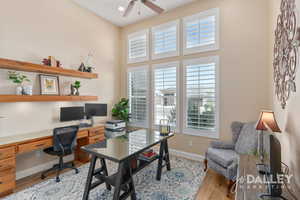 The office is the first room as you enter the house on the right. It is open and bright.