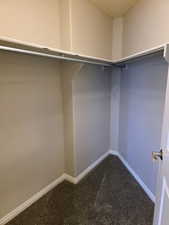 Primary room walk in closet