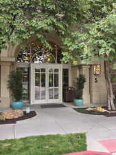 Doorway to property featuring french doors