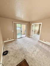 PATIO OFF OF THE SLIDING DOORS IN THE FAMILY ROOM!