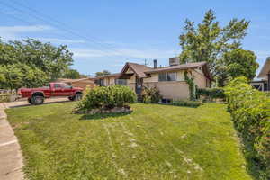 View of front of property featuring brick siding