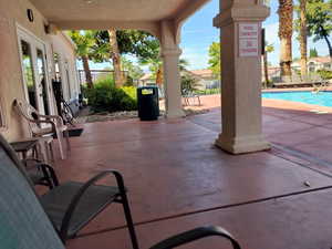 View of patio / terrace with a community pool